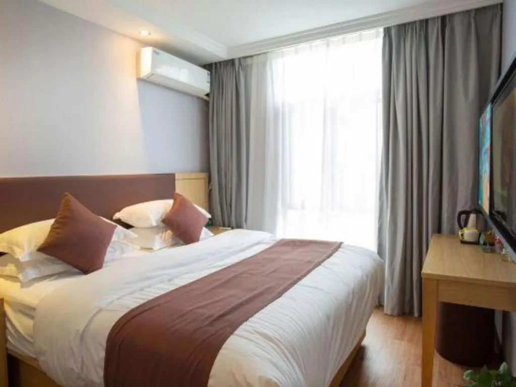 Bed in GYA Hotel Shanghai Songjiang Wanda Plaza