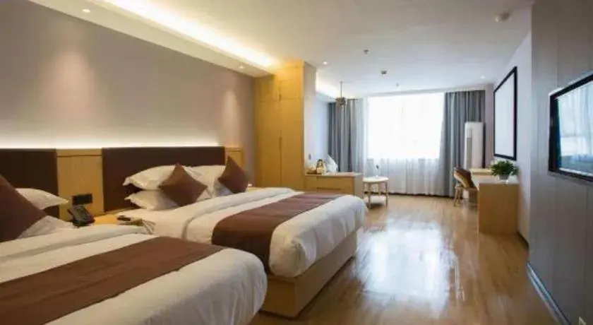 Bed in GYA Hotel Shanghai Songjiang Wanda Plaza Bed in GYA Hotel Shanghai Songjiang Wanda Plaza