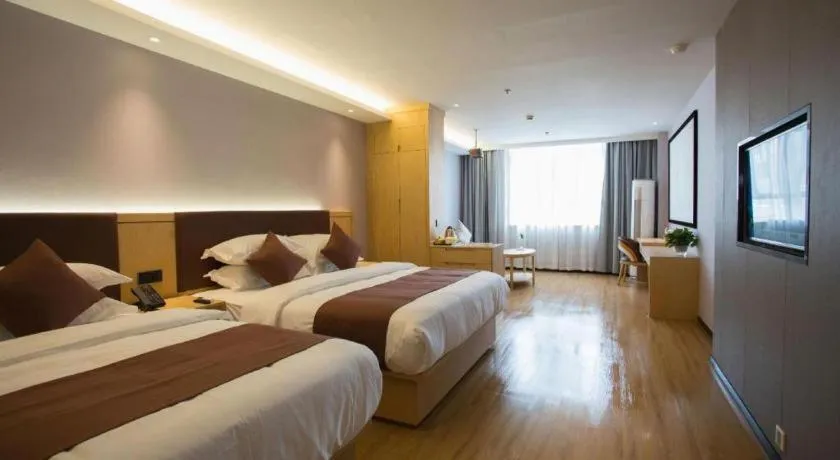 Bed in GYA Hotel Shanghai Songjiang Wanda Plaza
