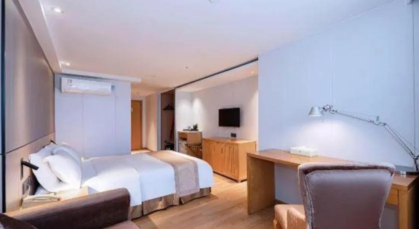 Bed in Zhongshan Louis Hotel