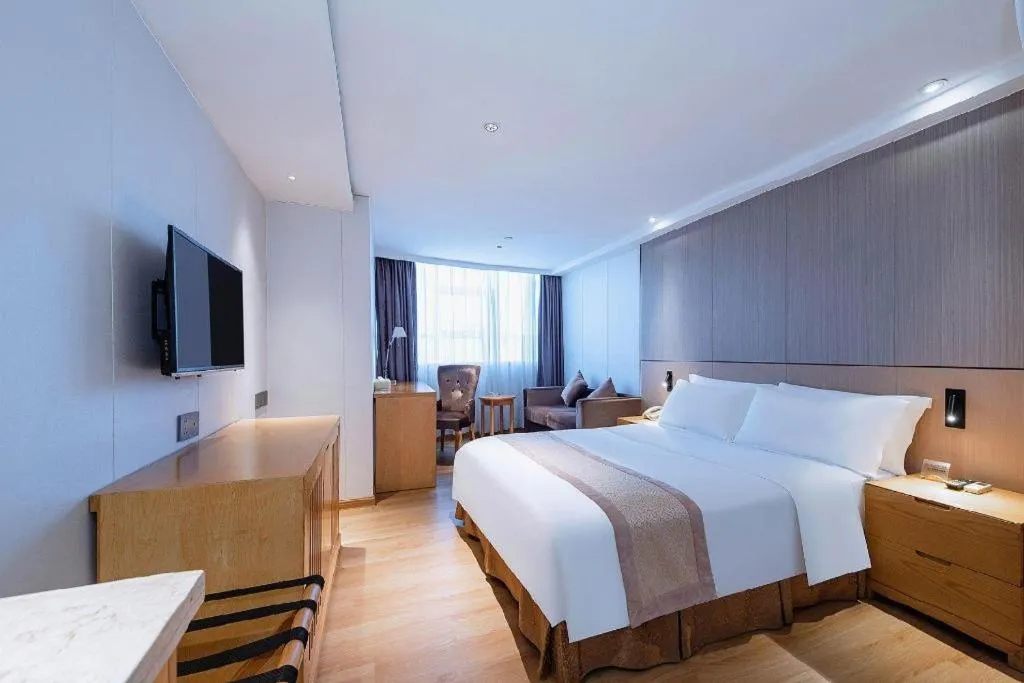 Bed in Zhongshan Louis Hotel