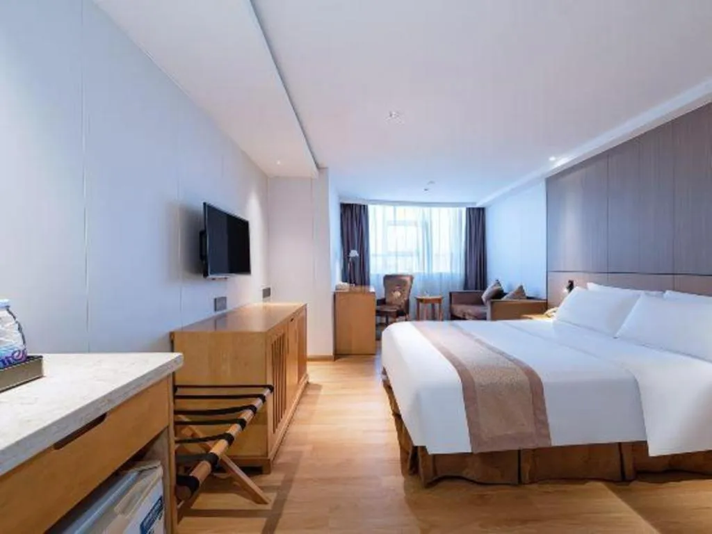 Bed in Zhongshan Louis Hotel