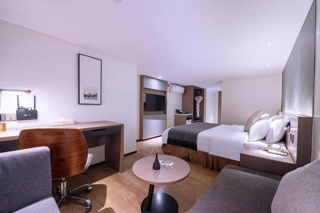 Bed in Zhongshan Louis Hotel