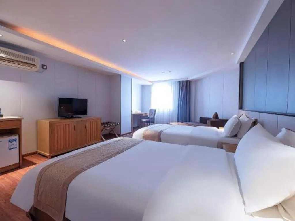 Bed in Zhongshan Louis Hotel