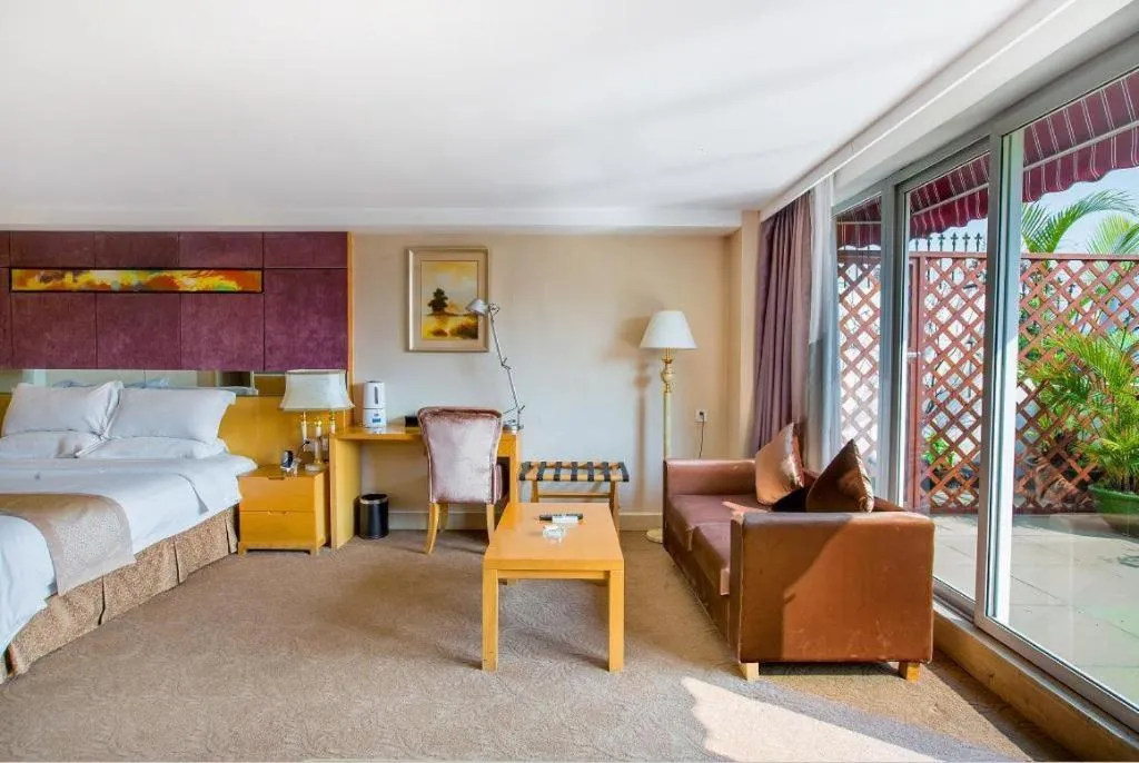 Bed in Zhongshan Louis Hotel