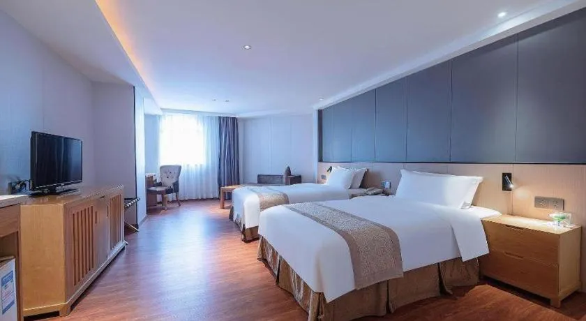 Bed in Zhongshan Louis Hotel