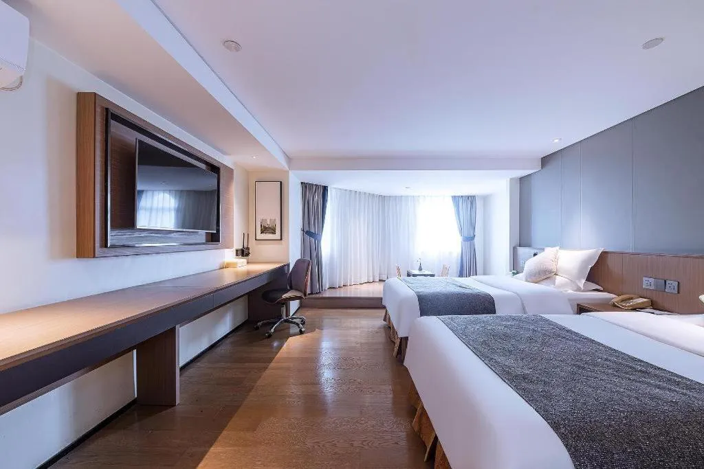 Bed in Zhongshan Louis Hotel