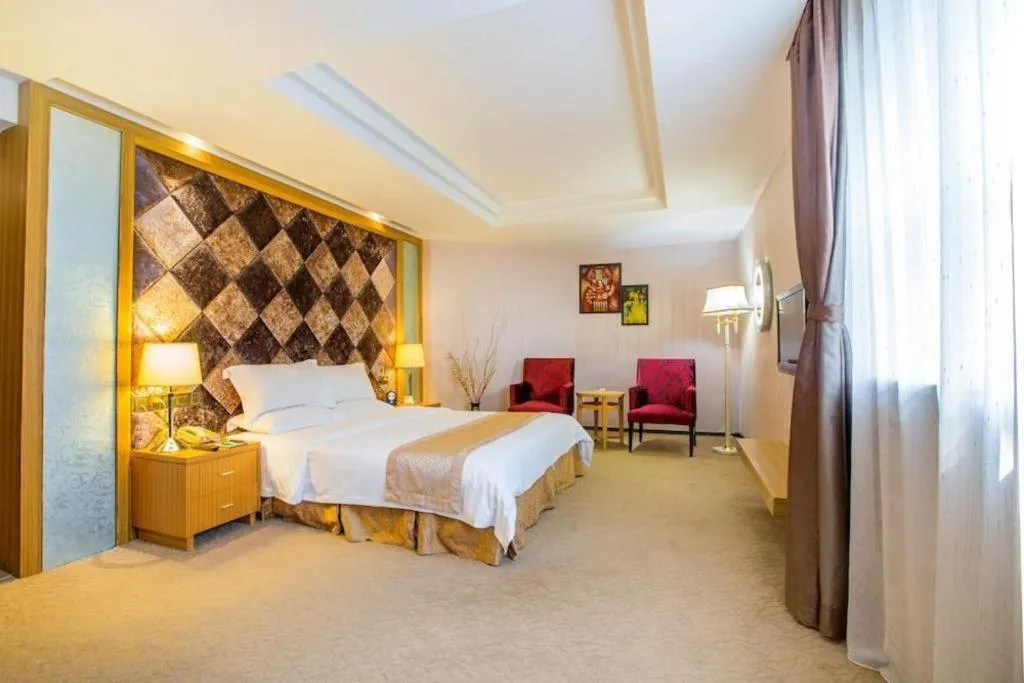 Bed in Zhongshan Louis Hotel