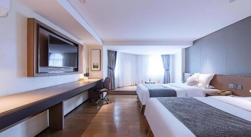 Bed in Zhongshan Louis Hotel