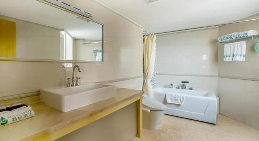 Bed in Zhongshan Louis Hotel