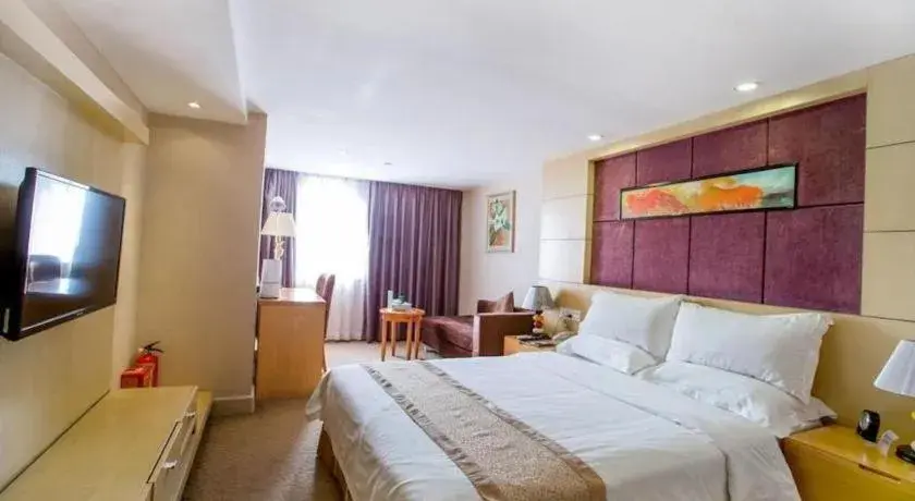 Bed in Zhongshan Louis Hotel Bed in Zhongshan Louis Hotel