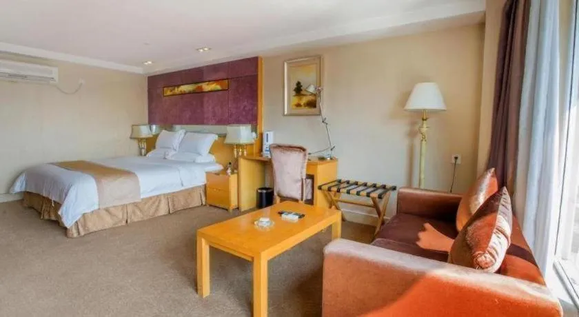 Bed in Zhongshan Louis Hotel