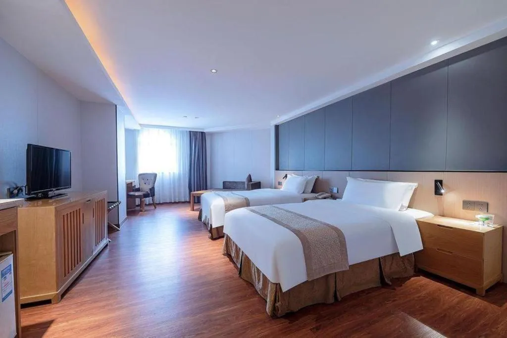 Bed in Zhongshan Louis Hotel