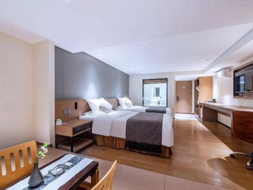 Bed in Zhongshan Louis Hotel