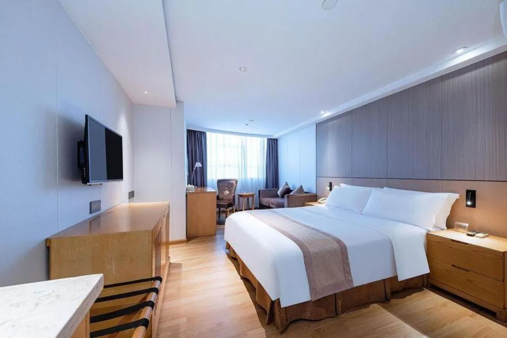 Bed in Zhongshan Louis Hotel