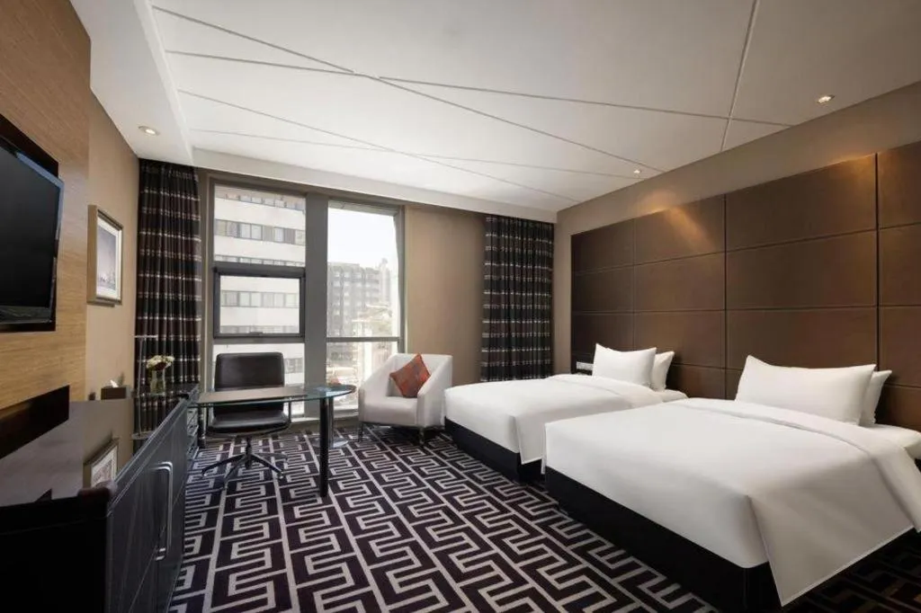 Bed in Brigh Radiance Hotel Yantai