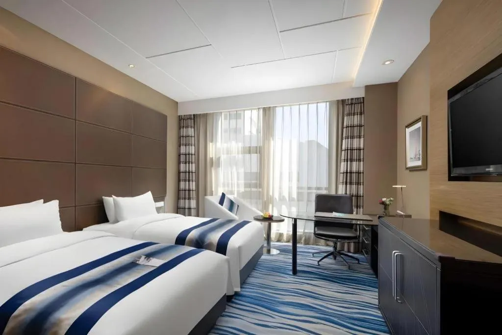 Bed in Brigh Radiance Hotel Yantai