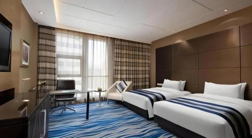 Bed in Brigh Radiance Hotel Yantai