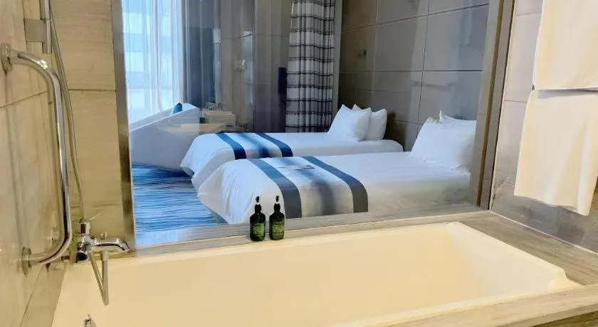 Bed in Brigh Radiance Hotel Yantai