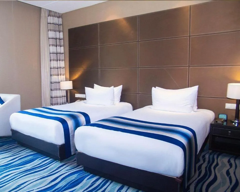 Bed in Brigh Radiance Hotel Yantai