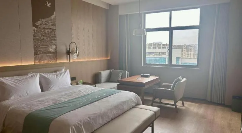 Bed in Zhangjiagang Jiangnan Garden Hotel