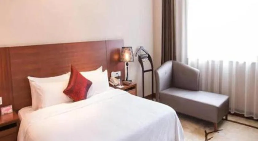 Bed in Zhangjiagang Jiangnan Garden Hotel