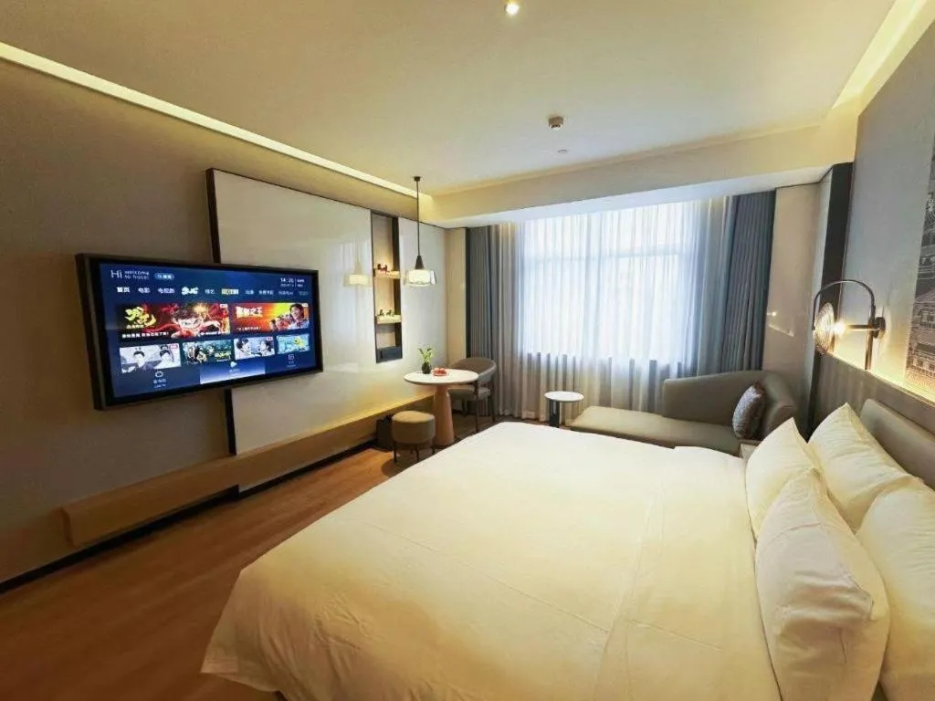 Bed in Zhangjiagang Jiangnan Garden Hotel