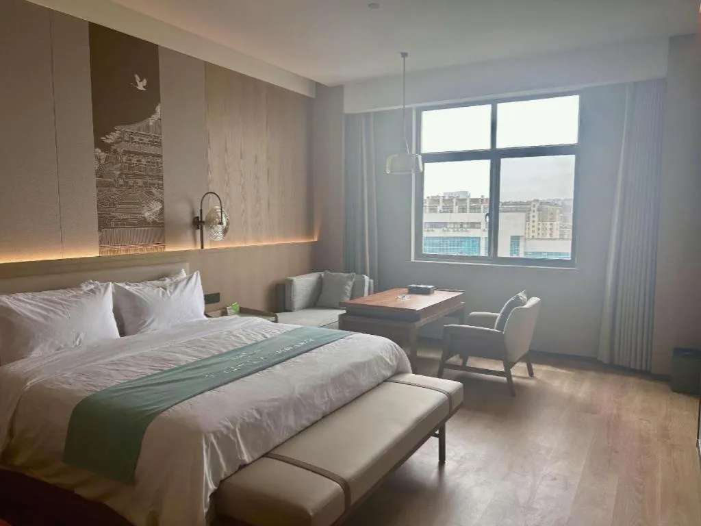 Bed in Zhangjiagang Jiangnan Garden Hotel