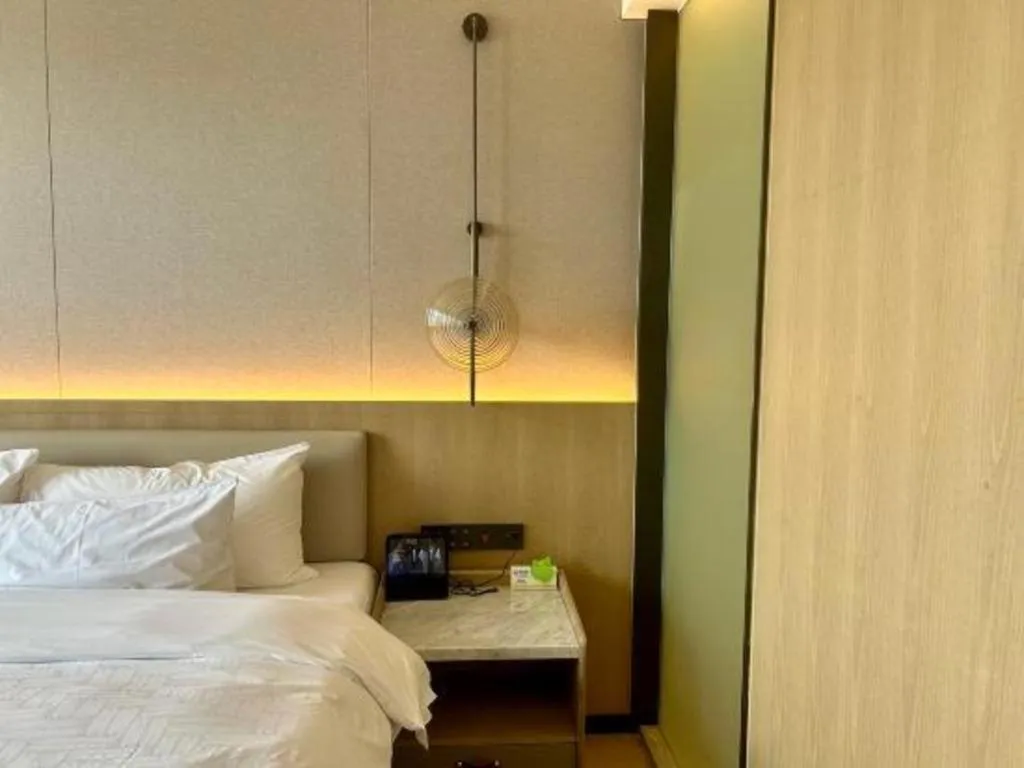 Bed in Zhangjiagang Jiangnan Garden Hotel