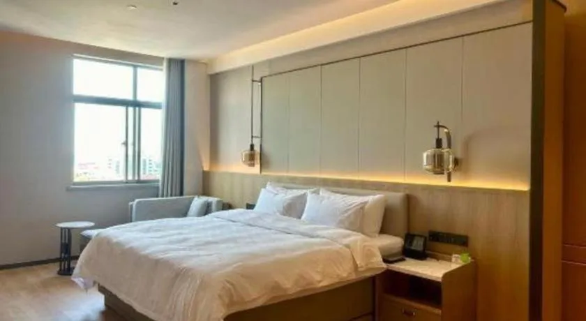 Bed in Zhangjiagang Jiangnan Garden Hotel