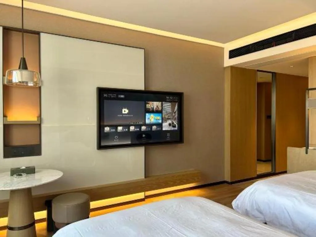 Bed in Zhangjiagang Jiangnan Garden Hotel