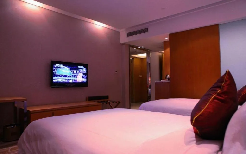 Bed in Zhangjiagang Jiangnan Garden Hotel