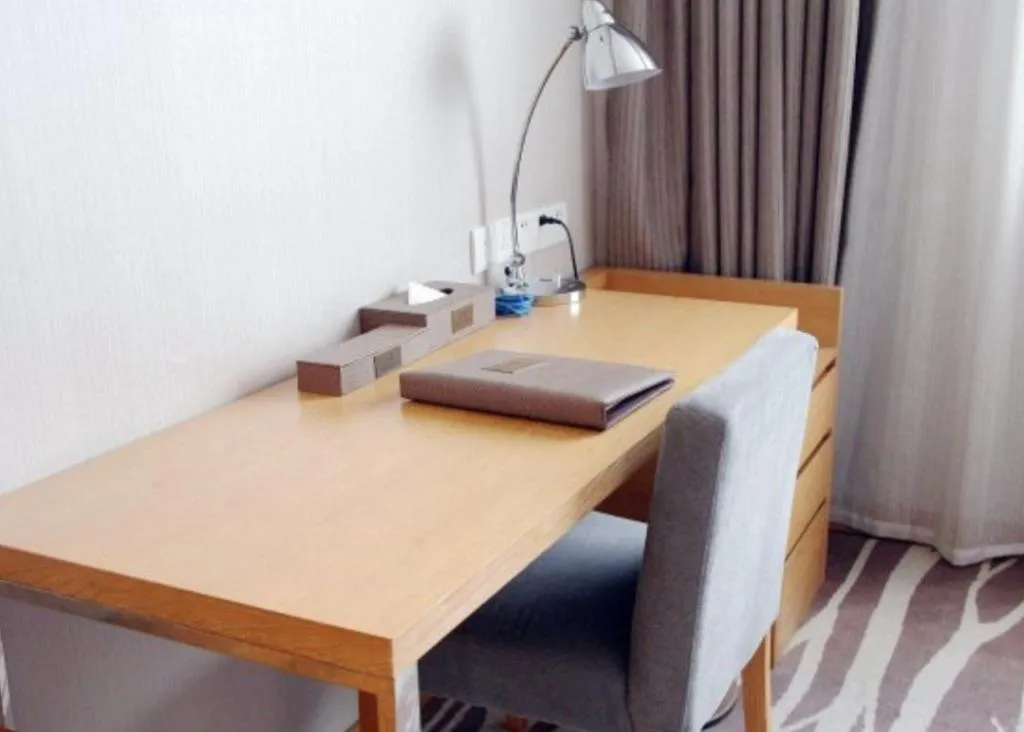 Bed in Zhangjiagang Jiangnan Garden Hotel