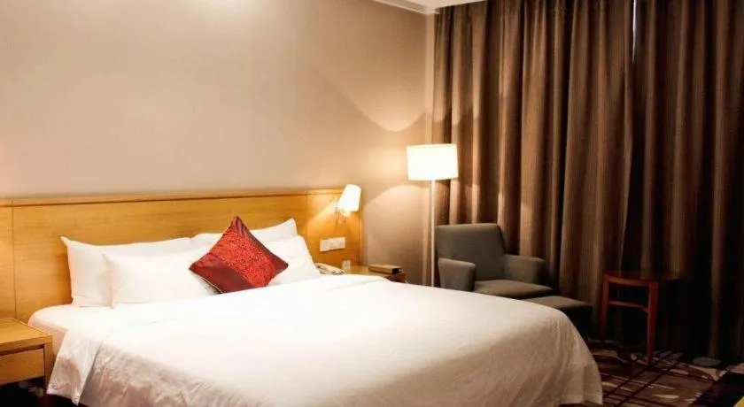 Bed in Zhangjiagang Jiangnan Garden Hotel