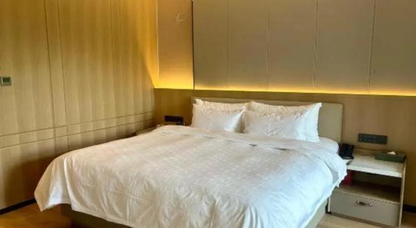 Bed in Zhangjiagang Jiangnan Garden Hotel