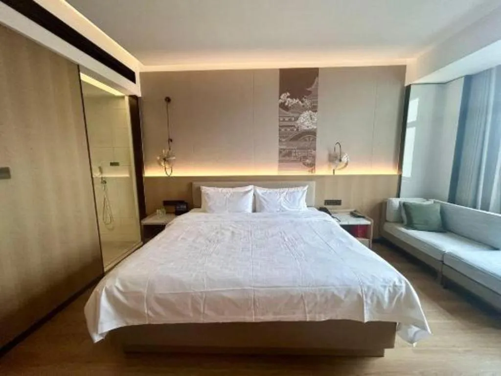 Bed in Zhangjiagang Jiangnan Garden Hotel