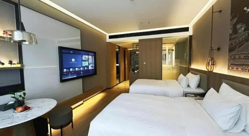 Bed in Zhangjiagang Jiangnan Garden Hotel