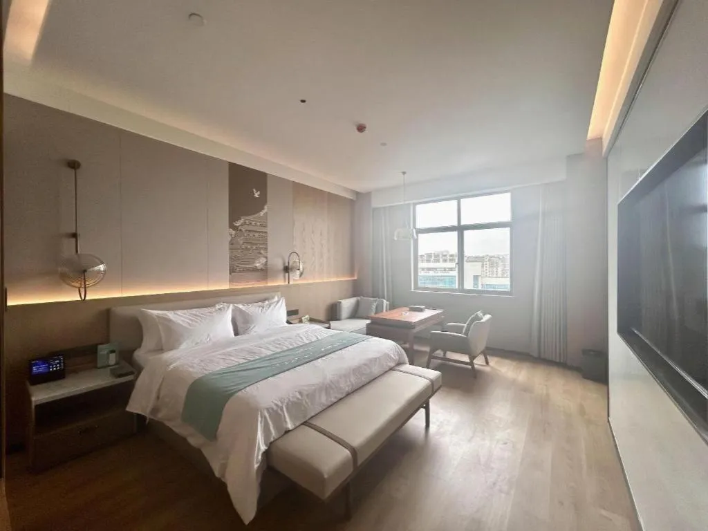 Bed in Zhangjiagang Jiangnan Garden Hotel