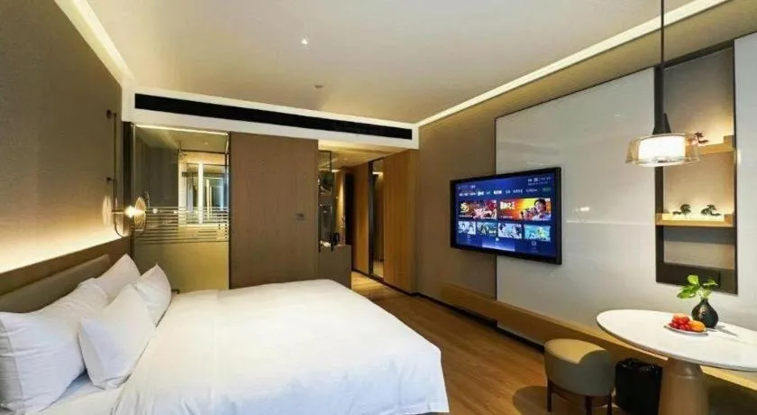 Bed in Zhangjiagang Jiangnan Garden Hotel