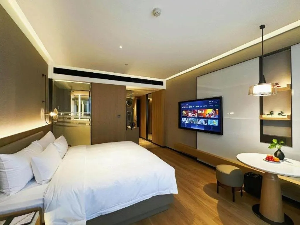 Bed in Zhangjiagang Jiangnan Garden Hotel