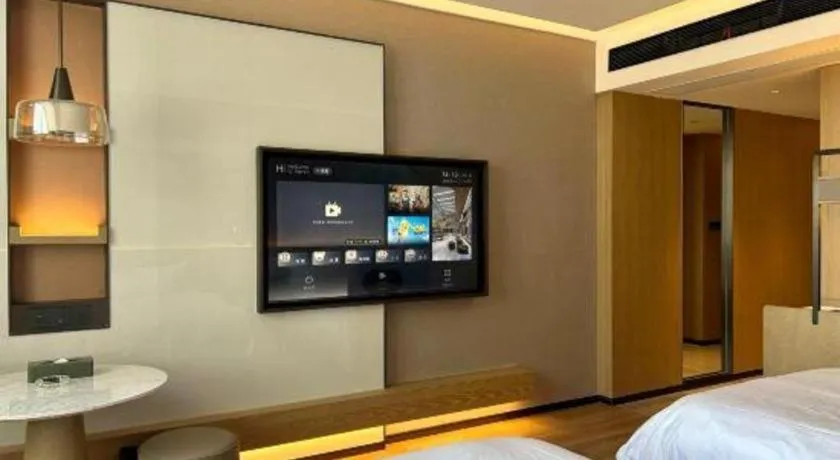 Bed in Zhangjiagang Jiangnan Garden Hotel