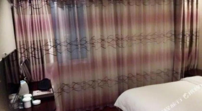 Bed in GreenTree Inn Suzhou Wujiang Zhenze Town Zhennan Road Express Hotel