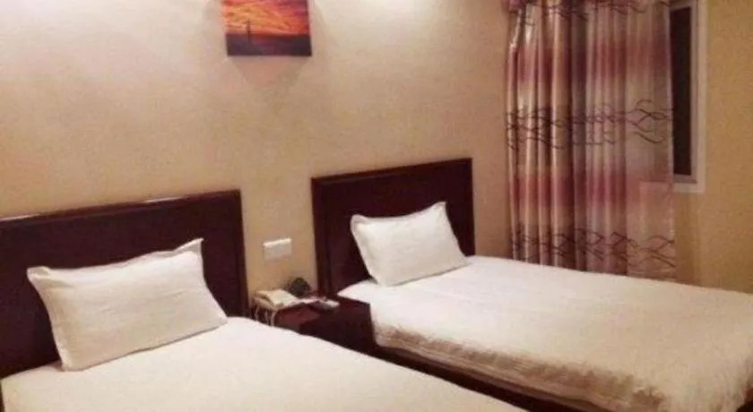 Bed in GreenTree Inn Suzhou Wujiang Zhenze Town Zhennan Road Express Hotel