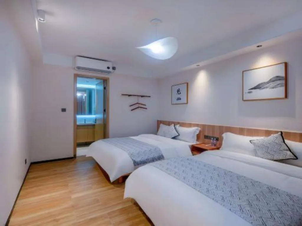 Bed in Island Skylight Resort