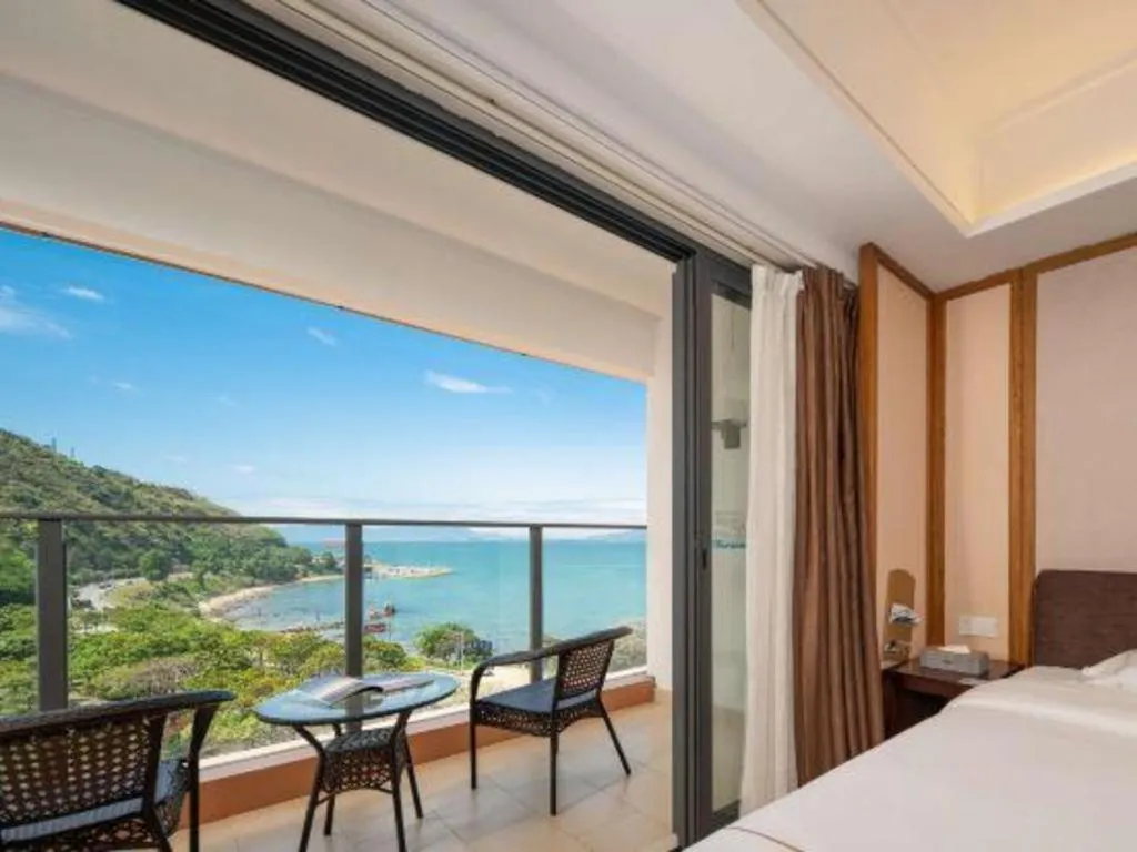 Bed in Island Skylight Resort