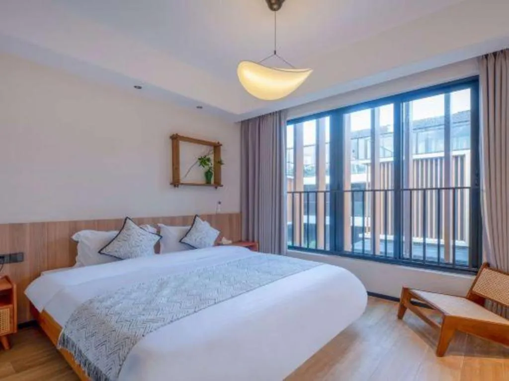 Bed in Island Skylight Resort