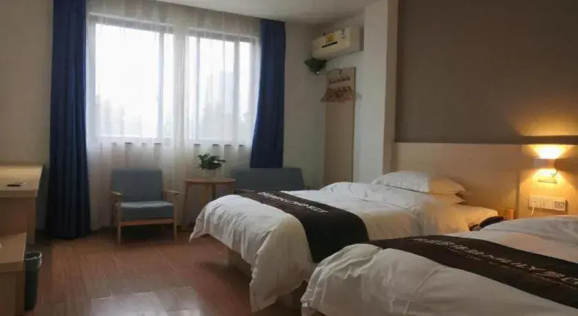 Bed in 7 Days Inn Ningbo Xiangshan Renmin Plaza Branch Bed in 7 Days Inn Ningbo Xiangshan Renmin Plaza Branch