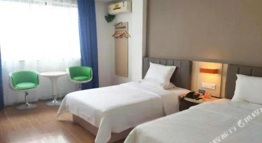 Bed in 7 Days Inn Ningbo Xiangshan Renmin Plaza Branch Bed in 7 Days Inn Ningbo Xiangshan Renmin Plaza Branch