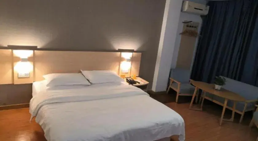 Bed in 7 Days Inn Ningbo Xiangshan Renmin Plaza Branch Bed in 7 Days Inn Ningbo Xiangshan Renmin Plaza Branch