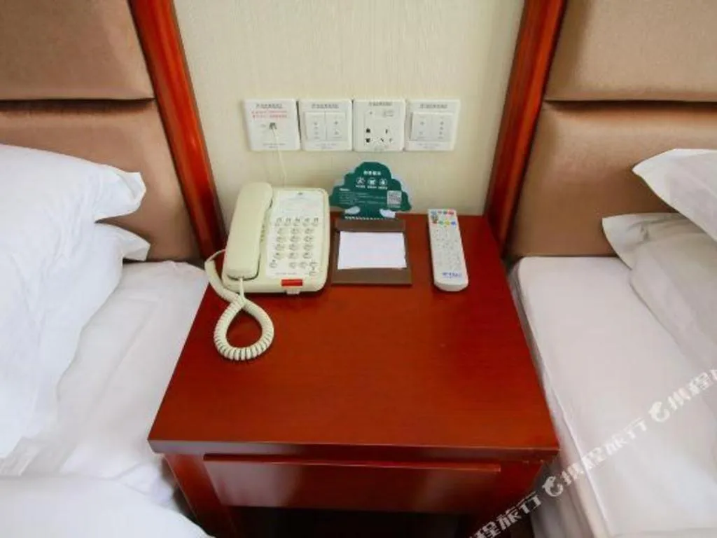 Bed in GreenTree Inn Jiangsu Changzhou Henglin Town Shuntong Road Express Hotel